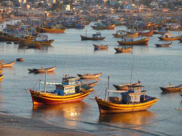 Fishing boats at sunset, Mui Ne