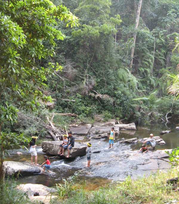 family enjoying the river